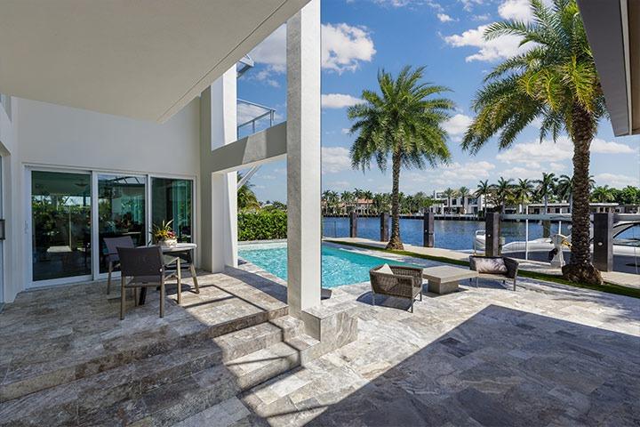 Naples backyard with private pool and view of the water